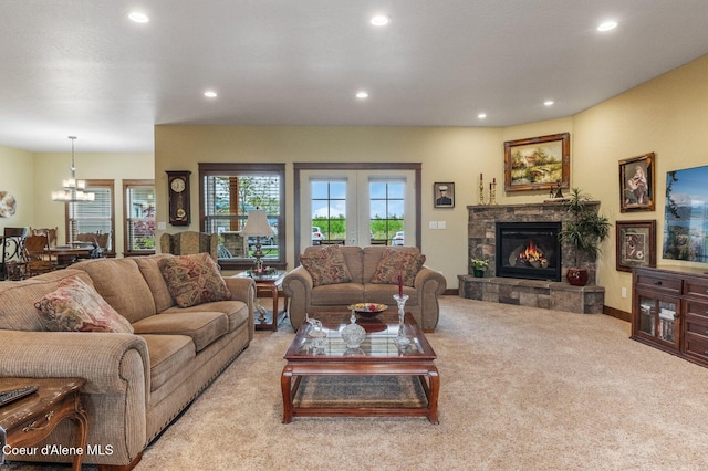 2795 Boekel Rd, Rathdrum, ID 83858 - carpeted living room featuring recessed lighting, a fireplace, and a chandelier
