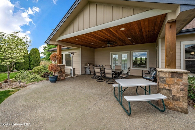 2795 Boekel Rd, Rathdrum, ID 83858 - view of patio featuring outdoor dining area, ceiling fan, and french doors