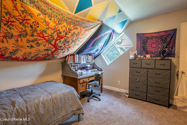 919 Silver Springs Rd, Moyie Springs, ID 83845 - carpeted bedroom with vaulted ceiling and baseboards
