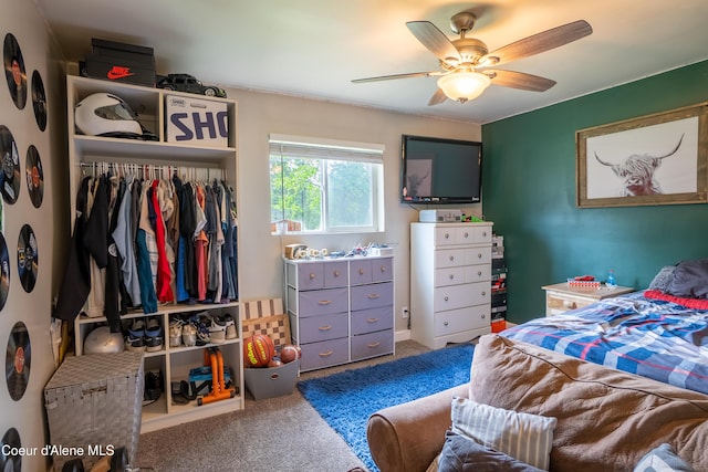 919 Silver Springs Rd, Moyie Springs, ID 83845 - carpeted bedroom with a ceiling fan