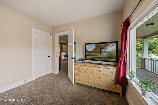 112 Washington St, Priest River, ID 83856 - bedroom featuring dark carpet and baseboards