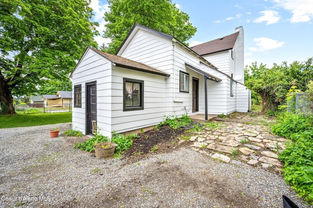 15152 N Mill St, Rathdrum, ID 83858 - view of front facade with roof with shingles