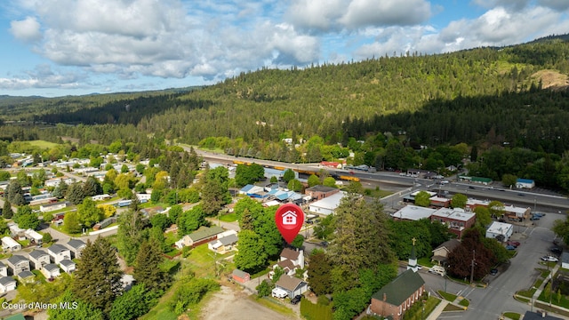 15152 N Mill St, Rathdrum, ID 83858 - aerial overview of property's location with a forest and nearby suburban area