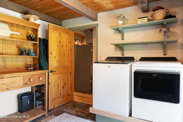 11 Hackney Ln, Sandpoint, ID 83864 - washroom with wood ceiling, separate washer and dryer, and dark wood-style flooring