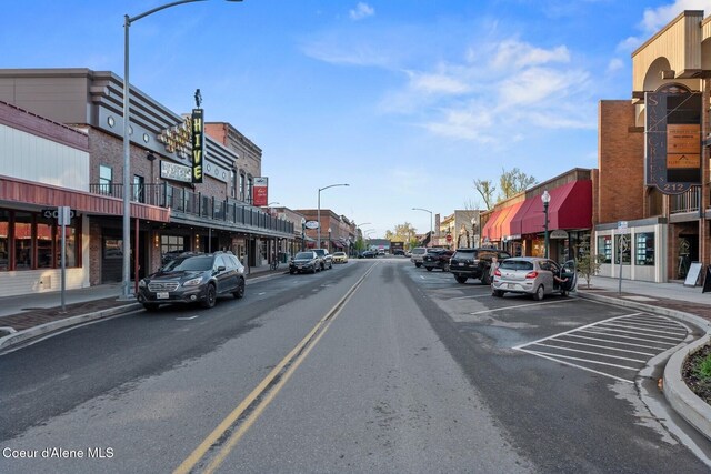 11 Hackney Ln, Sandpoint, ID 83864 - view of asphalt street with street lighting, sidewalks, and curbs