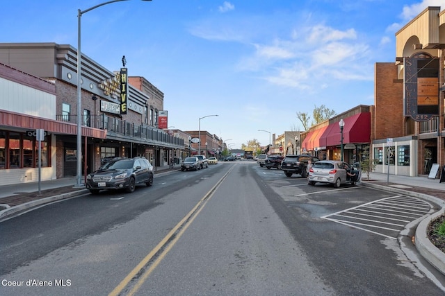 11 Hackney Ln, Sandpoint, ID 83864 - view of asphalt street with street lighting, sidewalks, and curbs
