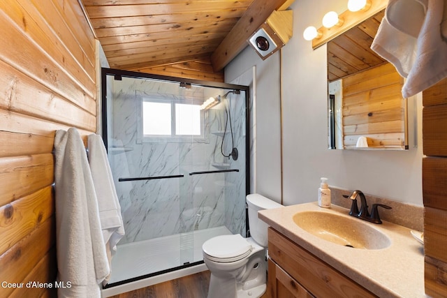 659 Whiskey Jack Rd, Sandpoint, ID 83864 - full bath with wooden ceiling, vanity, lofted ceiling, toilet, and wooden walls