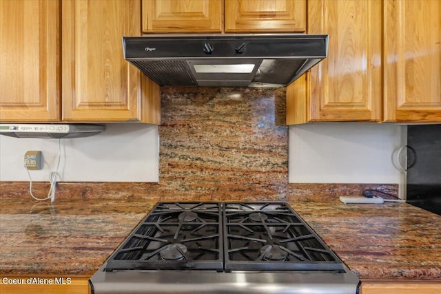 12696 N Dover Ln, Hayden, ID 83835 - kitchen with under cabinet range hood and dark stone countertops