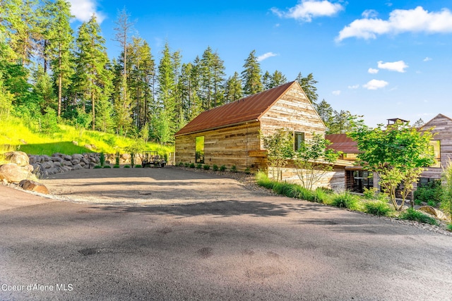 6361 S Cormorant Ct, Harrison, ID 83833 - view of front of home with metal roof