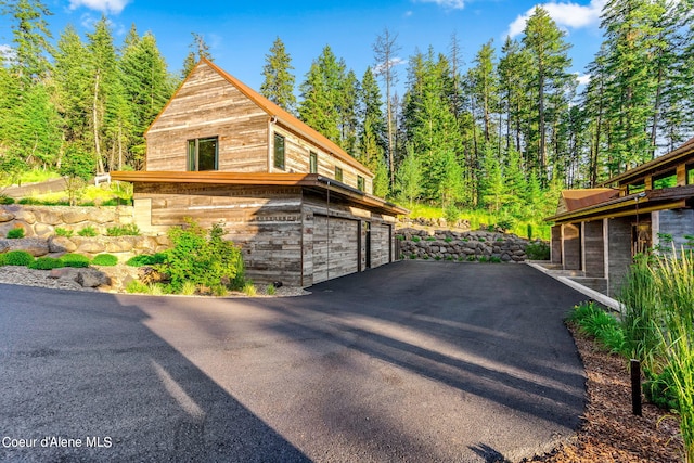 6361 S Cormorant Ct, Harrison, ID 83833 - garage featuring driveway