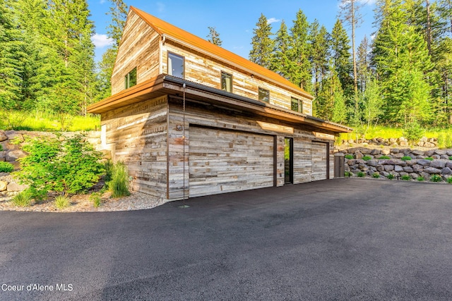 6361 S Cormorant Ct, Harrison, ID 83833 - garage featuring driveway