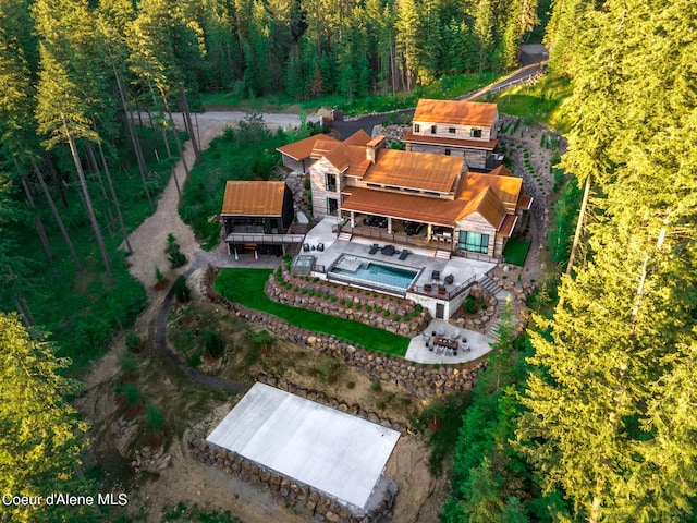 6361 S Cormorant Ct, Harrison, ID 83833 - view of subject property with a forest and a pool