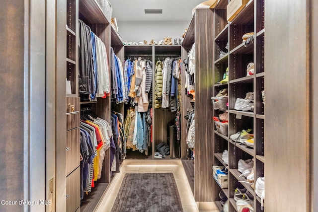 6361 S Cormorant Ct, Harrison, ID 83833 - walk in closet featuring tile patterned flooring