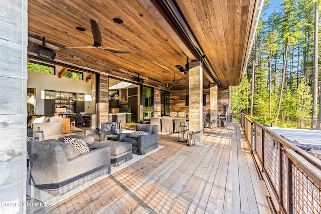 6361 S Cormorant Ct, Harrison, ID 83833 - wooden terrace featuring ceiling fan, area for grilling, and an outdoor living space