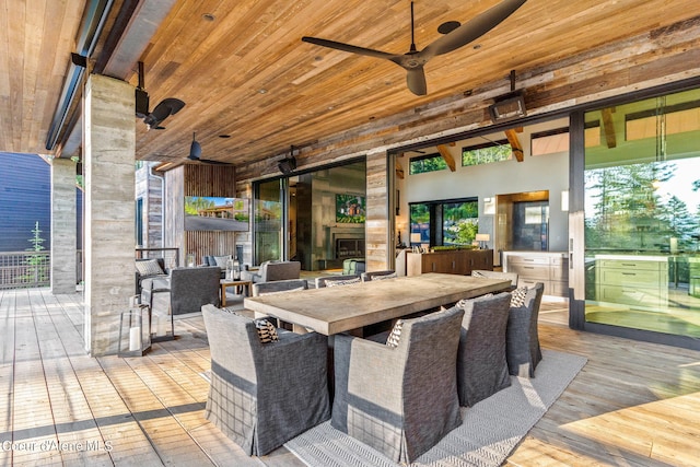 6361 S Cormorant Ct, Harrison, ID 83833 - wooden terrace with a ceiling fan and outdoor dining space
