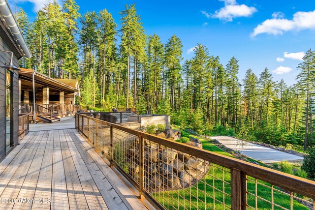 6361 S Cormorant Ct, Harrison, ID 83833 - deck with a wooded view