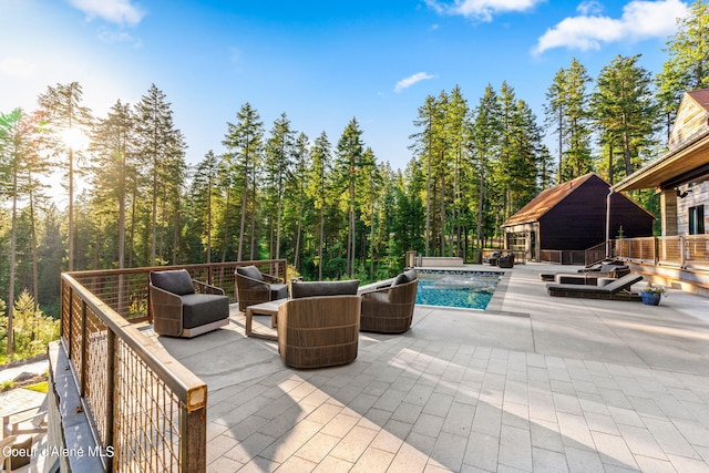 6361 S Cormorant Ct, Harrison, ID 83833 - view of patio / terrace with an outdoor pool