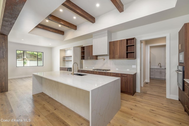 1456 E Ezra Ave, Hayden, ID 83835 - kitchen featuring open shelves, a sink, stainless steel appliances, beamed ceiling, and light wood-type flooring