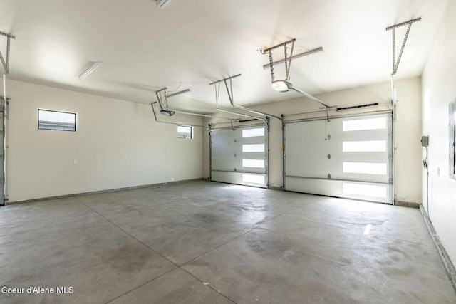 1456 E Ezra Ave, Hayden, ID 83835 - garage featuring a garage door opener