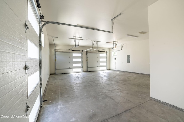 1456 E Ezra Ave, Hayden, ID 83835 - garage with electric panel and baseboards