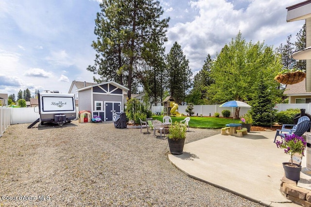 7156 W Christine St, Rathdrum, ID 83858 - fenced backyard featuring a patio