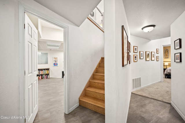 3061 E Lake Forest Dr, Hayden Lake, ID 83835 - stairway featuring baseboards