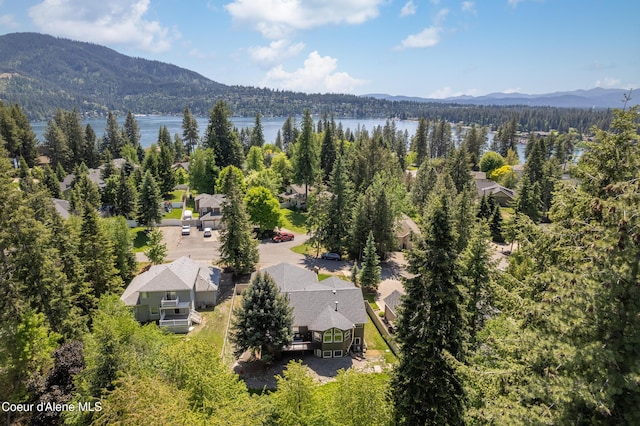 3061 E Lake Forest Dr, Hayden Lake, ID 83835 - view from above of property featuring a water and mountain view and a heavily wooded area