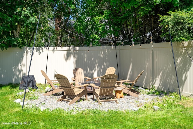 3061 E Lake Forest Dr, Hayden Lake, ID 83835 - view of yard with an outdoor fire pit