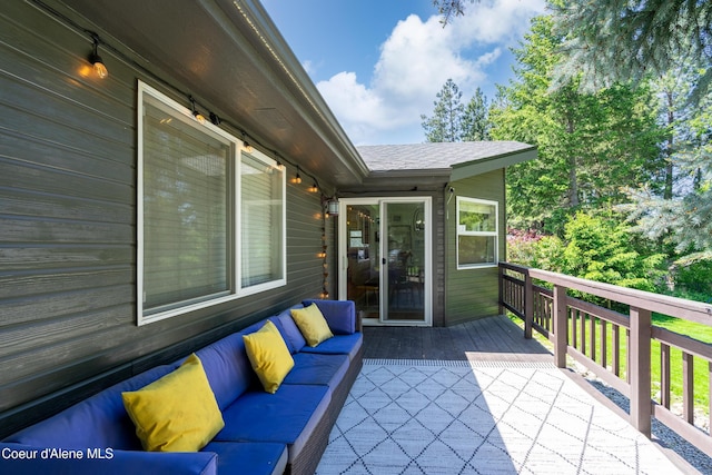 3061 E Lake Forest Dr, Hayden Lake, ID 83835 - wooden deck with an outdoor hangout area