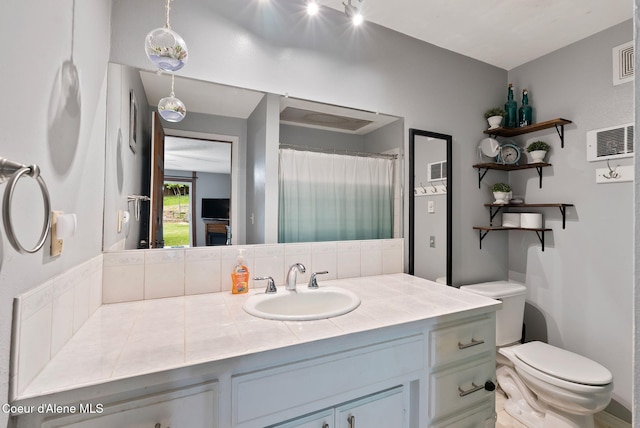 272 Hidden Springs Rd, Sandpoint, ID 83864 - bathroom featuring toilet, vanity, and curtained shower