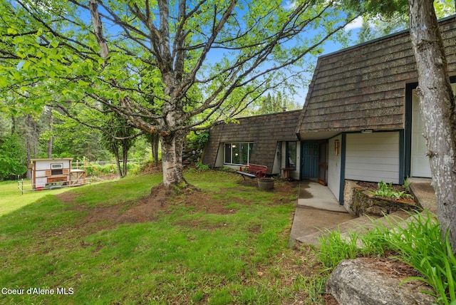 272 Hidden Springs Rd, Sandpoint, ID 83864 - view of green lawn featuring an outbuilding