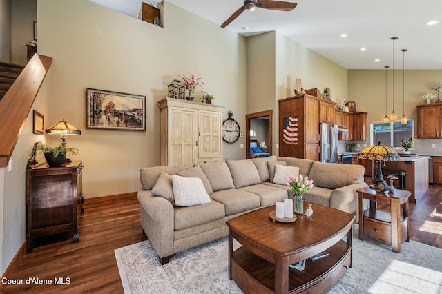 1803 W Felton Dr, Coeur Dalene, ID 83814 - living area with a high ceiling, wood finished floors, ceiling fan, baseboards, and recessed lighting