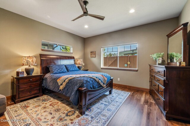 1803 W Felton Dr, Coeur Dalene, ID 83814 - bedroom featuring multiple windows, recessed lighting, wood finished floors, baseboards, and ceiling fan