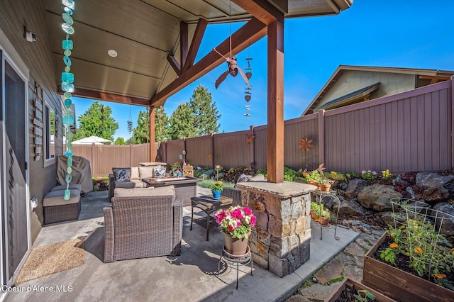 1803 W Felton Dr, Coeur Dalene, ID 83814 - fenced backyard with a patio area and an outdoor living space