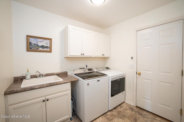 9105 N Prescott Dr, Hayden, ID 83835 - washroom featuring independent washer and dryer and cabinet space