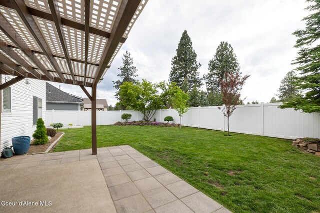 9105 N Prescott Dr, Hayden, ID 83835 - view of yard featuring a pergola and a patio area