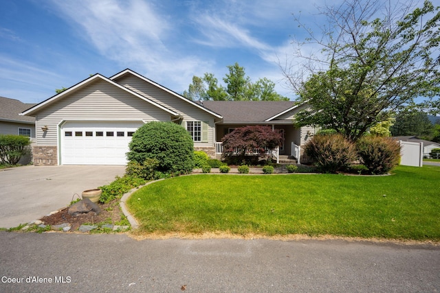 10016 N Zack Ct, Hayden, ID 83835 - ranch-style home with a garage, driveway, a front lawn, and brick siding