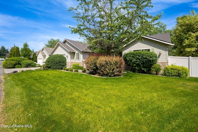 10016 N Zack Ct, Hayden, ID 83835 - view of property hidden behind natural elements with brick siding