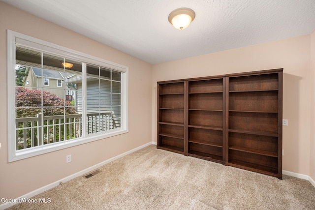 10016 N Zack Ct, Hayden, ID 83835 - spare room featuring carpet and baseboards