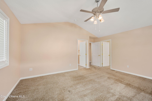 10016 N Zack Ct, Hayden, ID 83835 - unfurnished bedroom featuring lofted ceiling, carpet flooring, and a ceiling fan