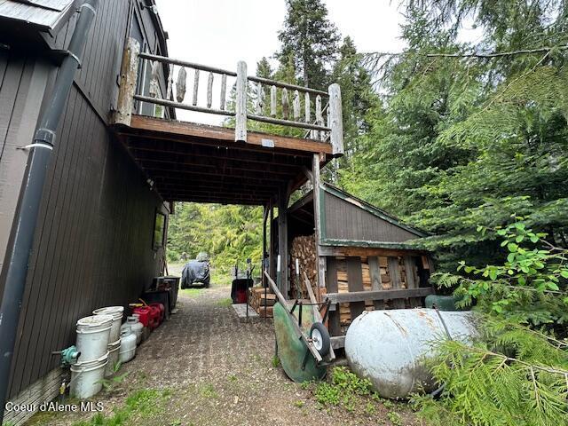 474 NW Fork Santa Creek Rd, Emida, ID 83861 - view of parking with an attached carport
