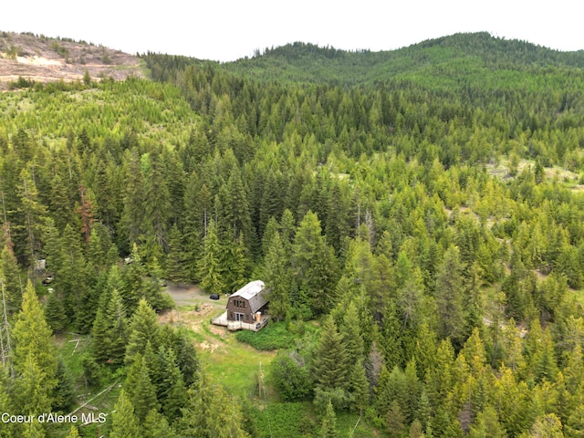 474 NW Fork Santa Creek Rd, Emida, ID 83861 - view of subject property with a heavily wooded area and mountains