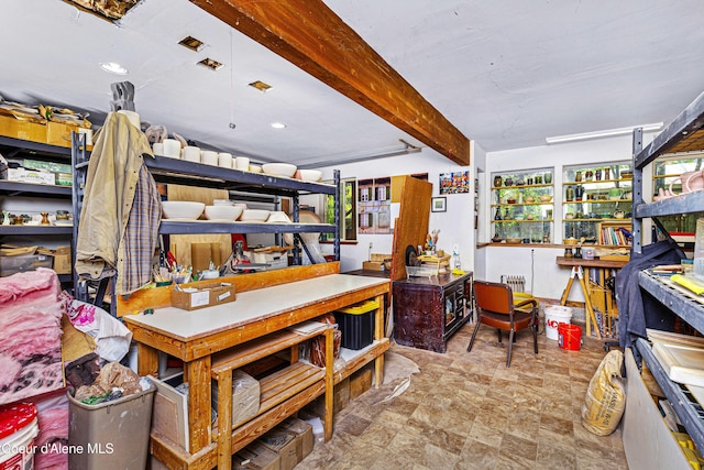 913 Cedar St, Sandpoint, ID 83864 - miscellaneous room with a workshop area, beamed ceiling, and stone finish flooring