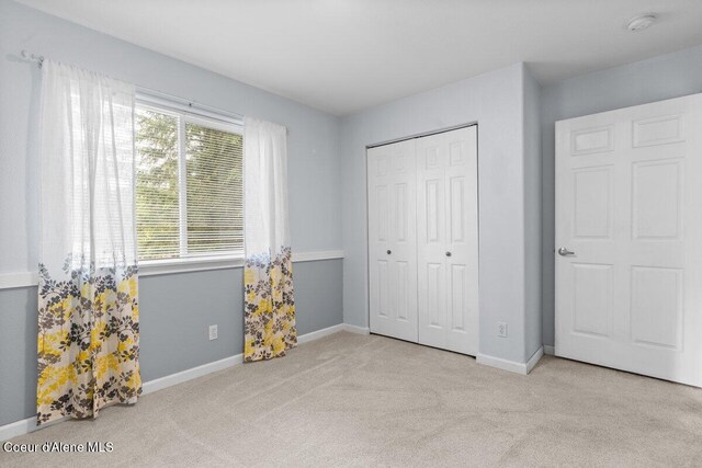 31716 N Middle Ave, Spirit Lake, ID 83869 - carpeted bedroom with a closet and baseboards