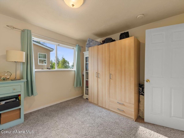 1824 W Cottonwood Rd, Worley, ID 83876 - unfurnished bedroom featuring carpet and baseboards