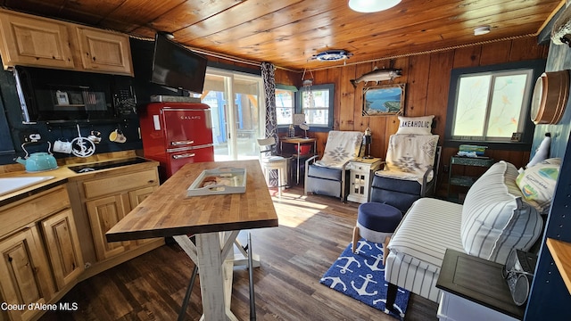 33671 N Macdonalds Unit 2Nd, Dock, Bayview, ID 83803 - kitchen featuring wooden ceiling, butcher block counters, wood finished floors, and wood walls