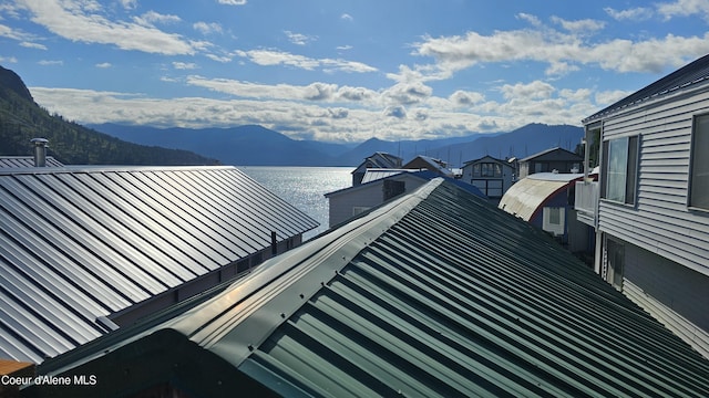 33671 N Macdonalds Unit 2Nd, Dock, Bayview, ID 83803 - wooden deck with a water and mountain view