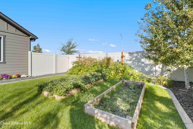 4447 N Connery Loop, Post Falls, ID 83854 - view of yard featuring a vegetable garden