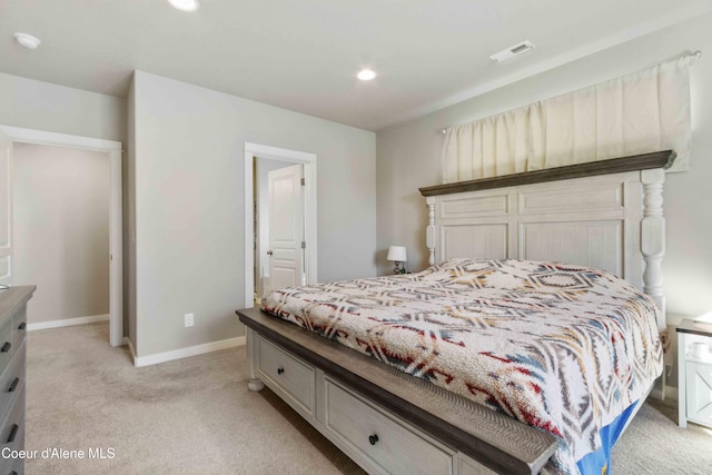 4447 N Connery Loop, Post Falls, ID 83854 - bedroom with light colored carpet, baseboards, and recessed lighting