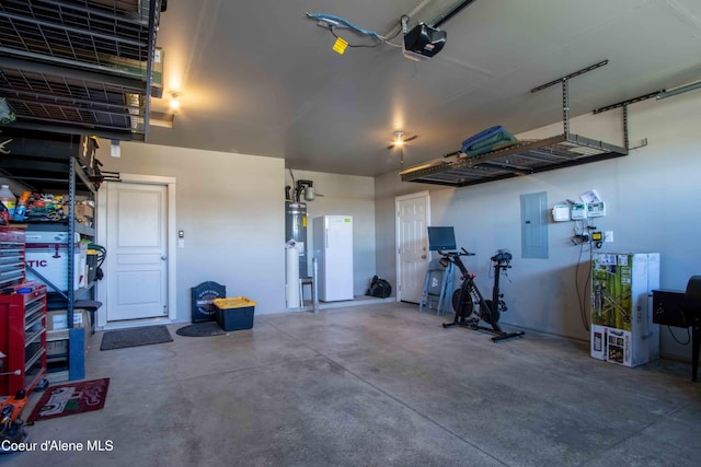 4447 N Connery Loop, Post Falls, ID 83854 - garage with a garage door opener and electric panel